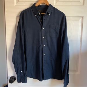 Blue Button Down with front pocket.